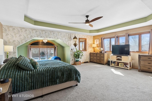 bedroom featuring wallpapered walls, carpet, and baseboards