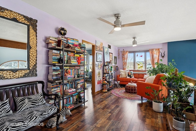 sitting room featuring a textured ceiling, ceiling fan, and hardwood / wood-style flooring