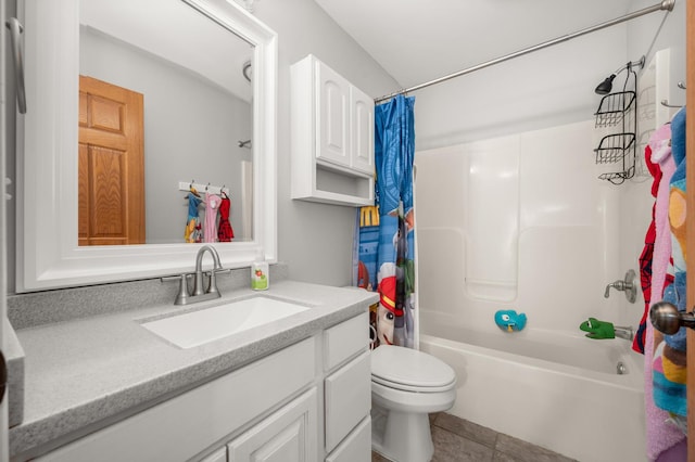 bathroom with shower / bath combo with shower curtain, toilet, vanity, and tile patterned flooring