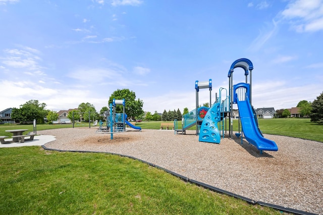 community playground featuring a yard