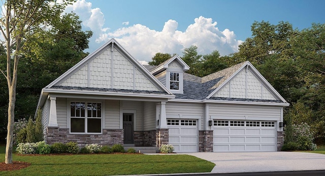 craftsman-style home featuring a garage, stone siding, concrete driveway, and a front lawn