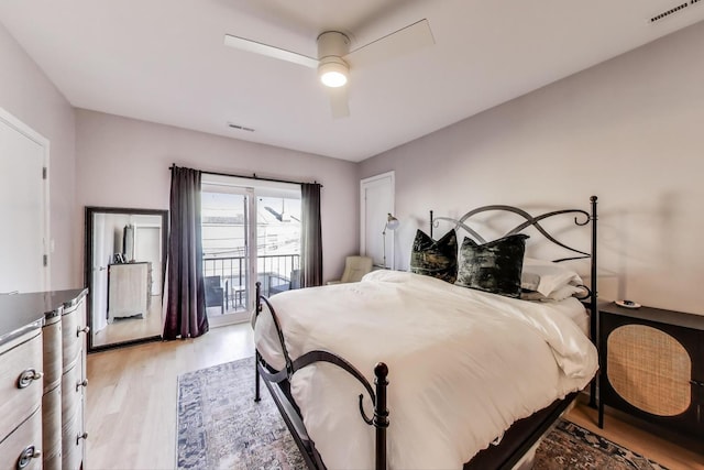 bedroom featuring access to exterior, visible vents, ceiling fan, and light wood-style floors