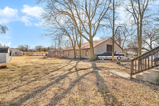 view of yard with fence