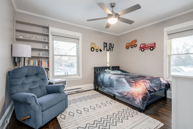 bedroom featuring baseboards, baseboard heating, wood finished floors, and crown molding