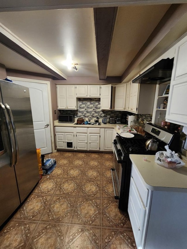 kitchen with white cabinetry and stainless steel appliances