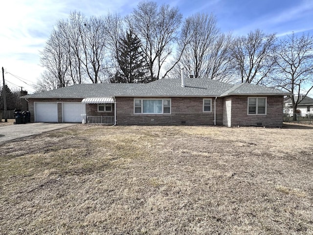 ranch-style home with brick siding, a shingled roof, a garage, crawl space, and driveway