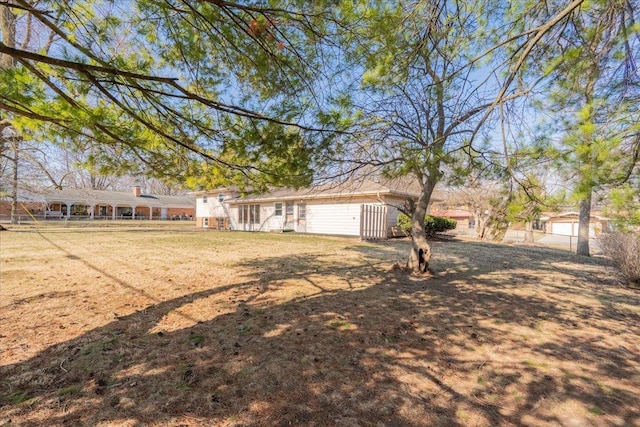 view of yard with fence