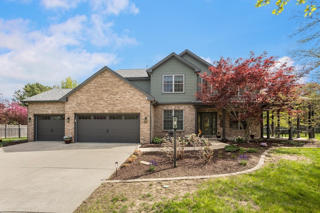 4201 Brittany Trail Dr, Champaign, IL 61822 - craftsman house featuring fence, a front lawn, brick siding, a garage, and concrete driveway