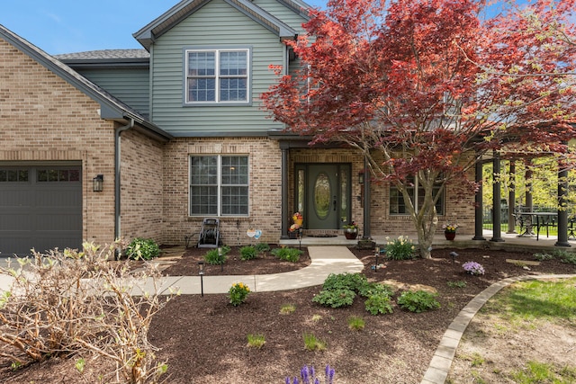 4201 Brittany Trail Dr, Champaign, IL 61822 - traditional home featuring a garage and brick siding