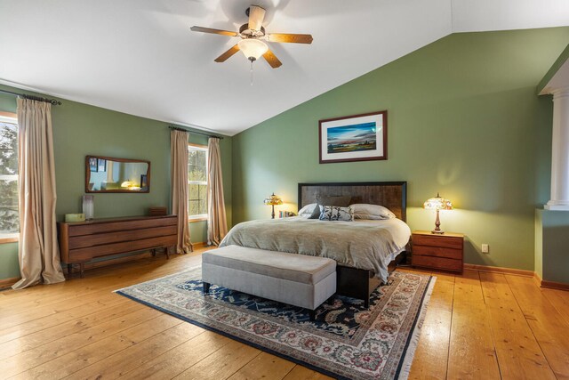 4201 Brittany Trail Dr, Champaign, IL 61822 - bedroom with ornate columns, baseboards, hardwood / wood-style flooring, and lofted ceiling
