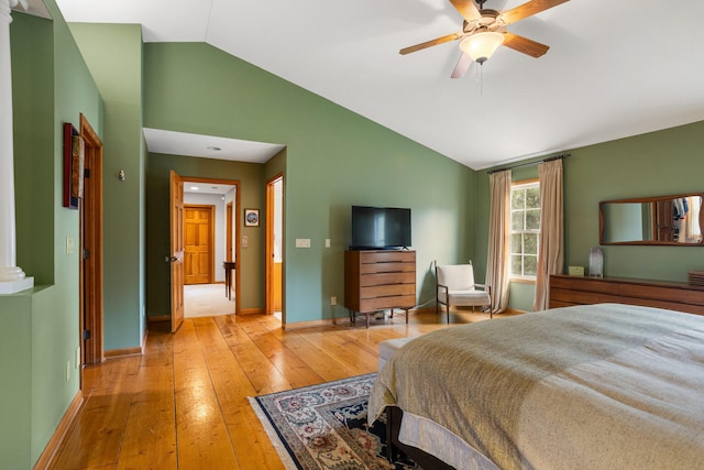 4201 Brittany Trail Dr, Champaign, IL 61822 - bedroom featuring a ceiling fan, baseboards, lofted ceiling, and light wood-type flooring