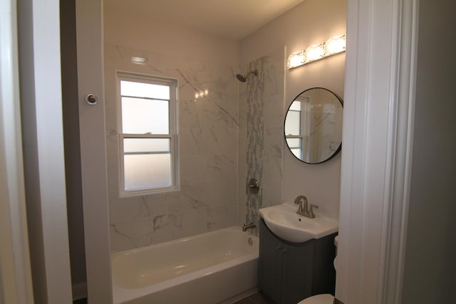 full bath featuring vanity and bathtub / shower combination