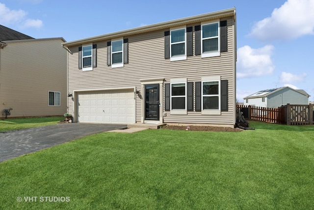 view of front of property with aphalt driveway, an attached garage, a front lawn, and fence