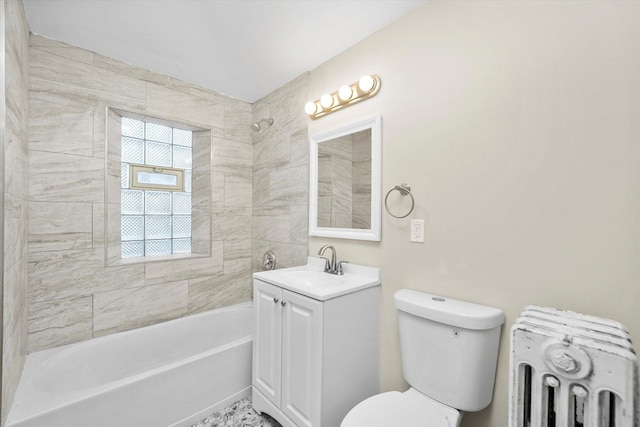 bathroom featuring toilet,  shower combination, radiator, and vanity