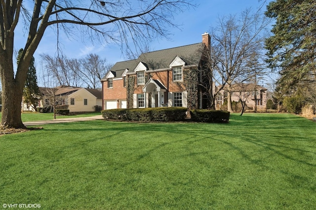 view of property exterior with brick siding, a lawn, a chimney, and an attached garage