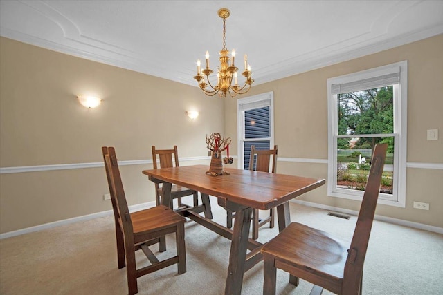 dining room featuring visible vents, baseboards, light colored carpet, and a chandelier