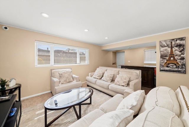 living room featuring recessed lighting, baseboards, and carpet