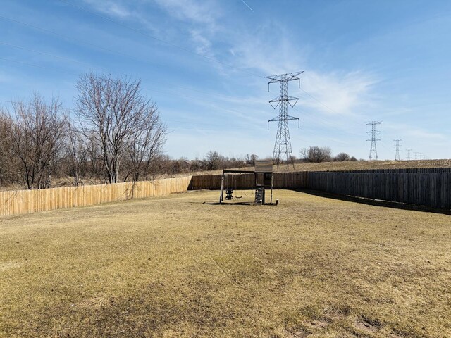 view of yard with a fenced backyard