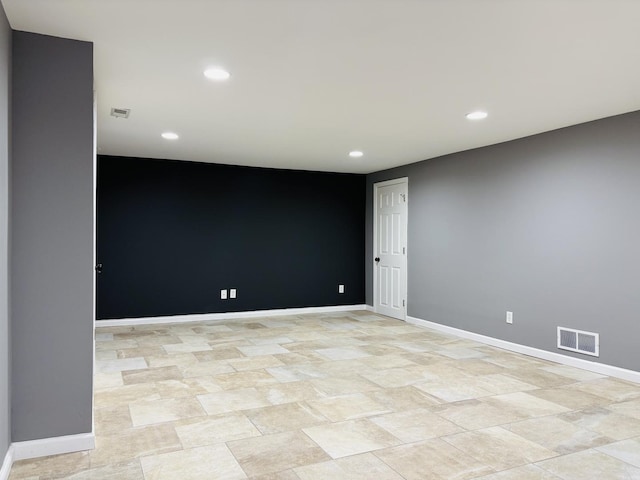 unfurnished room featuring recessed lighting, baseboards, and visible vents