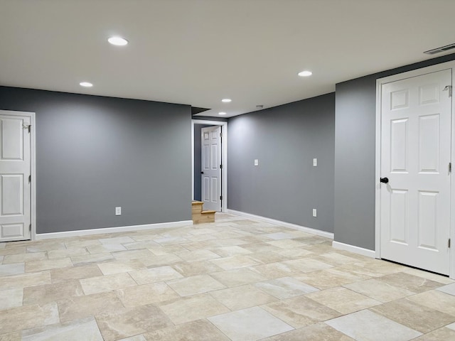 unfurnished room with visible vents, recessed lighting, and baseboards