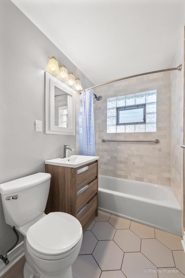 full bathroom with tile patterned flooring, shower / bath combination with curtain, toilet, and vanity