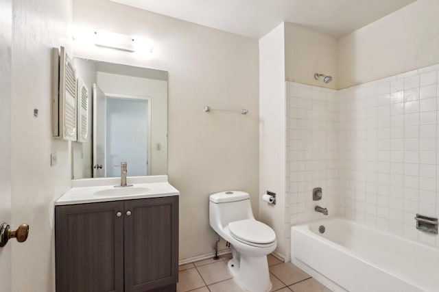 bathroom with tile patterned floors, shower / washtub combination, toilet, and vanity