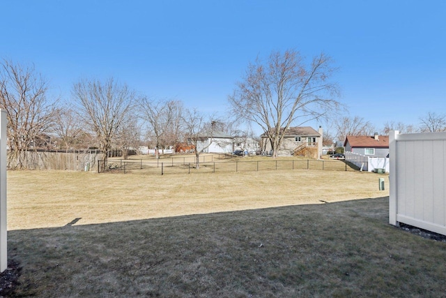 view of yard with fence