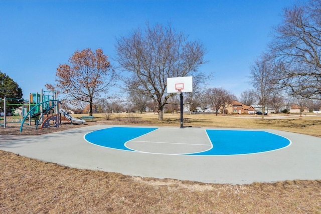 view of basketball court with community basketball court and playground community