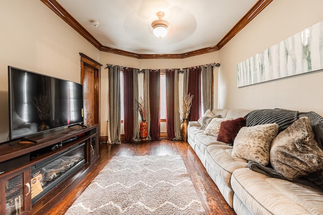 living area with dark wood-style floors and ornamental molding