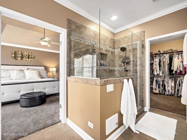 full bath with visible vents, a stall shower, ornamental molding, tile patterned flooring, and a spacious closet