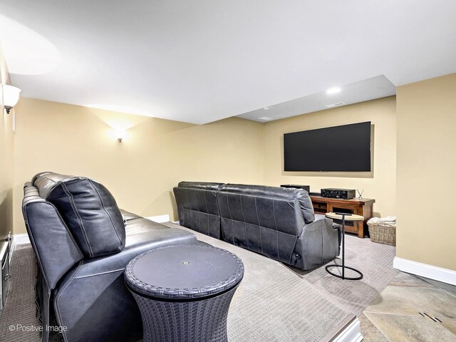 living room featuring baseboards