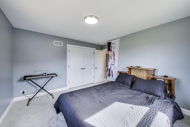 bedroom featuring visible vents, baseboards, and carpet flooring