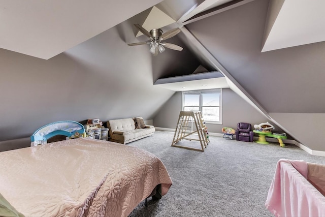 bedroom with carpet, baseboards, and vaulted ceiling