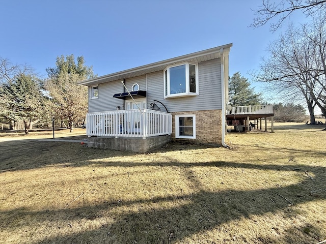 rear view of property with a deck