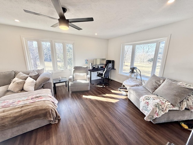 bedroom featuring recessed lighting, a textured ceiling, ceiling fan, and wood finished floors