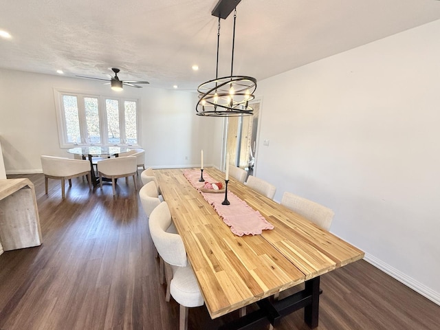 dining area featuring dark wood-style floors, recessed lighting, and baseboards