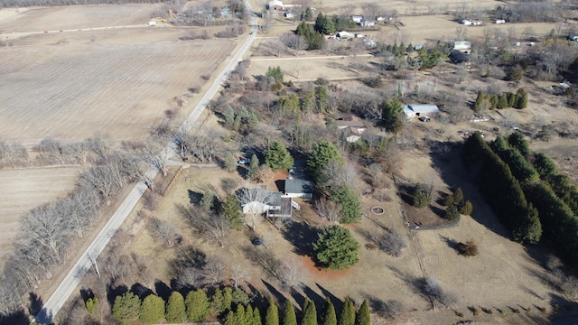 birds eye view of property featuring a rural view