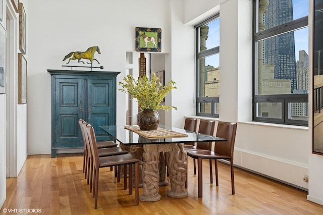680 N Lake Shore Dr Unit 1602, Chicago, IL 60611 - dining room featuring light wood-type flooring and a view of city