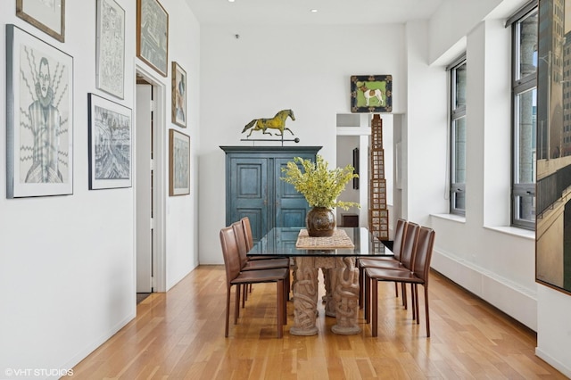 680 N Lake Shore Dr Unit 1602, Chicago, IL 60611 - dining space featuring light wood-style flooring and baseboards