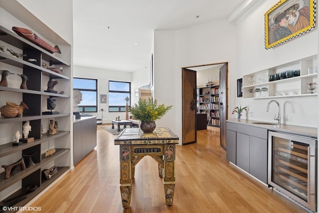 680 N Lake Shore Dr Unit 1602, Chicago, IL 60611 - indoor wet bar featuring wine cooler and light wood-style floors