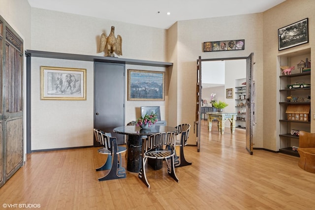 680 N Lake Shore Dr Unit 1602, Chicago, IL 60611 - dining space with light wood-style floors and baseboards