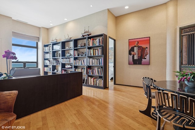 680 N Lake Shore Dr Unit 1602, Chicago, IL 60611 - office with wood finished floors, a towering ceiling, and recessed lighting