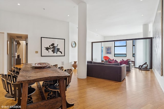 680 N Lake Shore Dr Unit 1602, Chicago, IL 60611 - dining space featuring light wood-style floors and ornate columns
