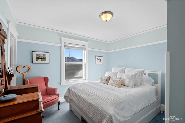 bedroom featuring carpet, baseboards, and ornamental molding