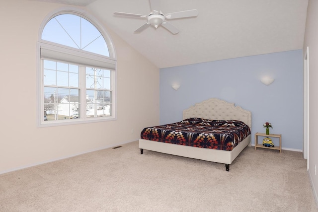 bedroom featuring baseboards, visible vents, lofted ceiling, ceiling fan, and carpet flooring