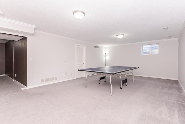 playroom featuring visible vents, crown molding, and carpet floors