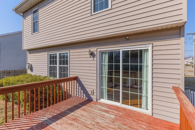 wooden deck featuring fence