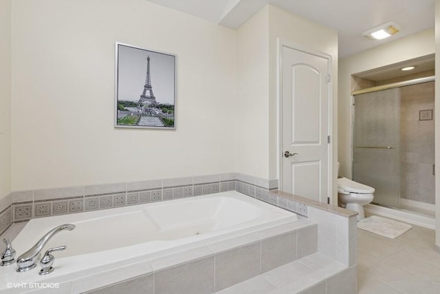 full bath with tile patterned floors, toilet, a stall shower, and a bath