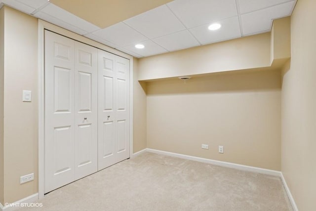 unfurnished bedroom featuring recessed lighting, a closet, carpet floors, and baseboards