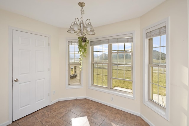 3916 Tallgrass Dr, Champaign, IL 61822 - unfurnished dining area featuring baseboards and a chandelier
